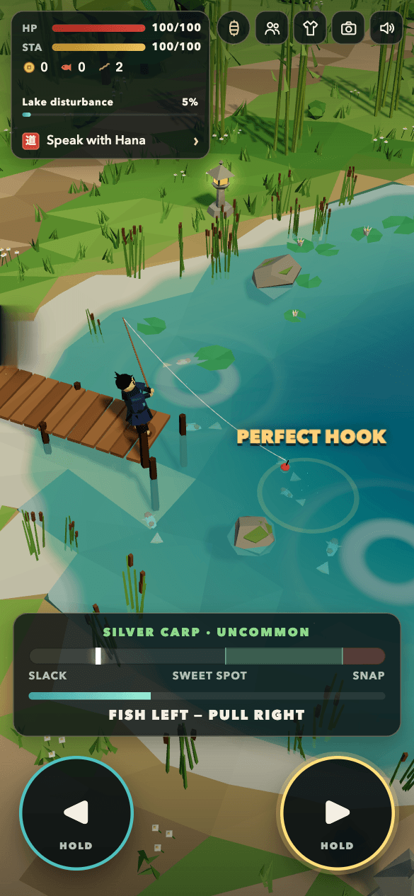 Fishing from the dock: a perfect hook on a silver carp, with the reel tension bar and hold buttons.